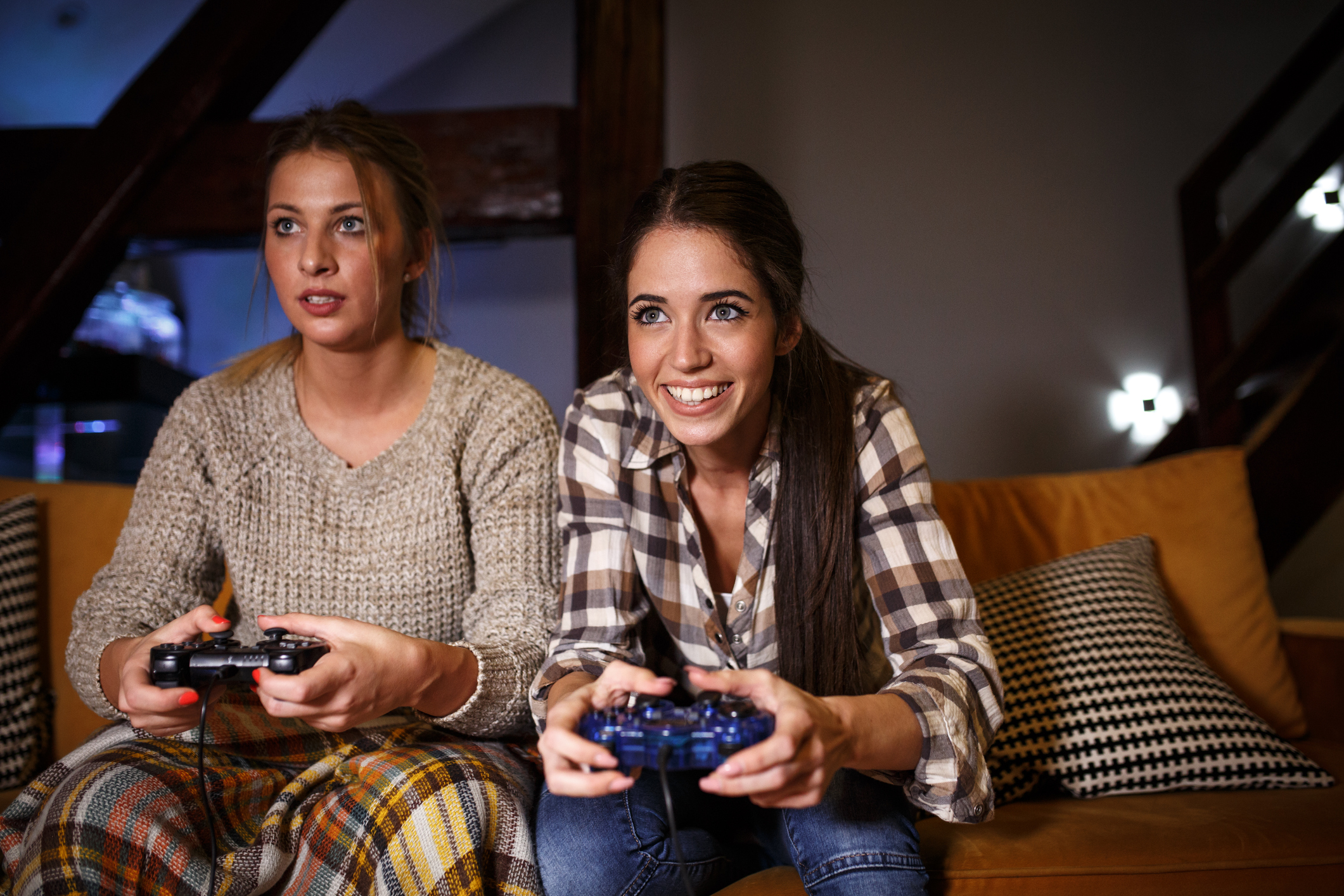 Two women playing a video game