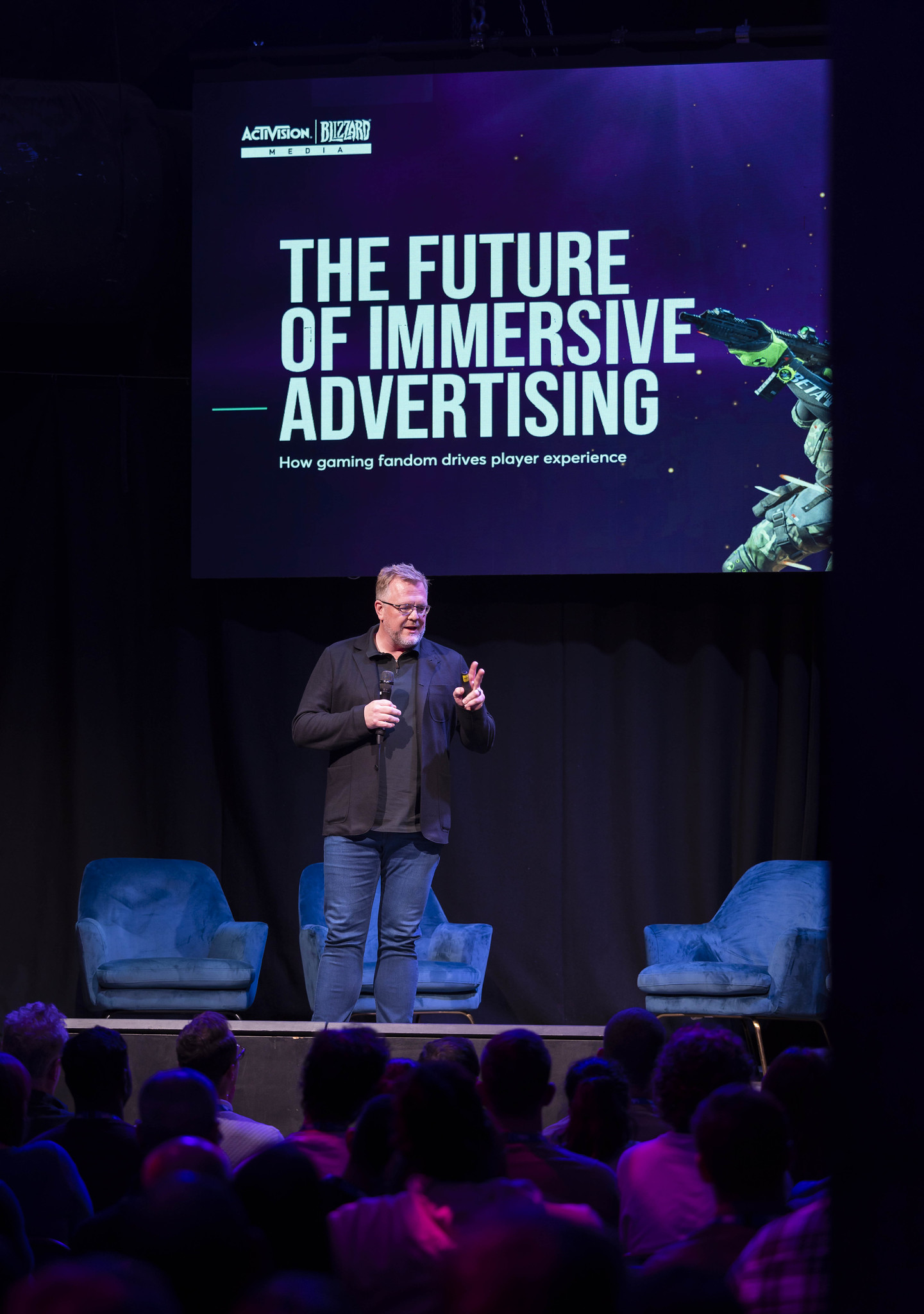 Mat Harris standing in front of the title slide of Activision Blizzard Media's IAB UK Gaming Upfronts presentation, "The Future of Immersive Advertising."